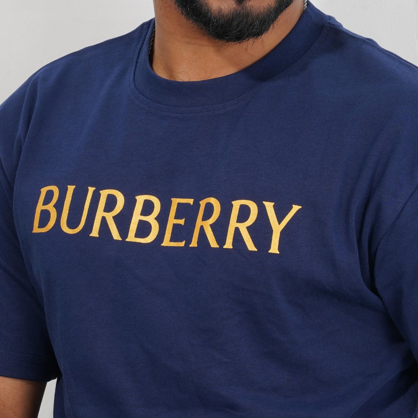 Blue Drop Shoulder T-Shirt With Golden Graphic Design - Image 2